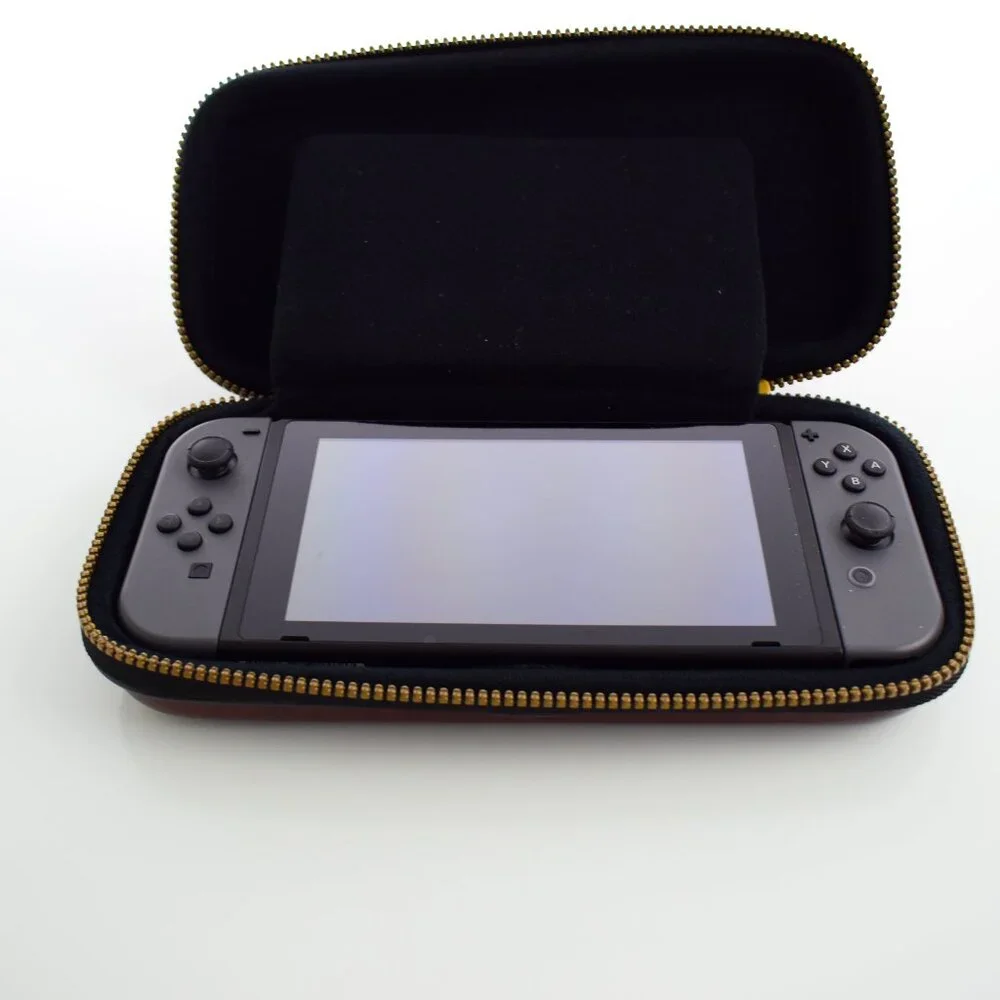 Nintendo Switch HAC-001 32GB Console with Gray Joy‑Con, Zelda case & 8 games inc
